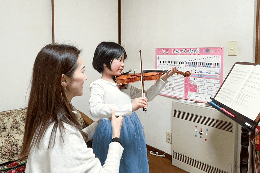 マンツーマンでレッスンをしている写真
